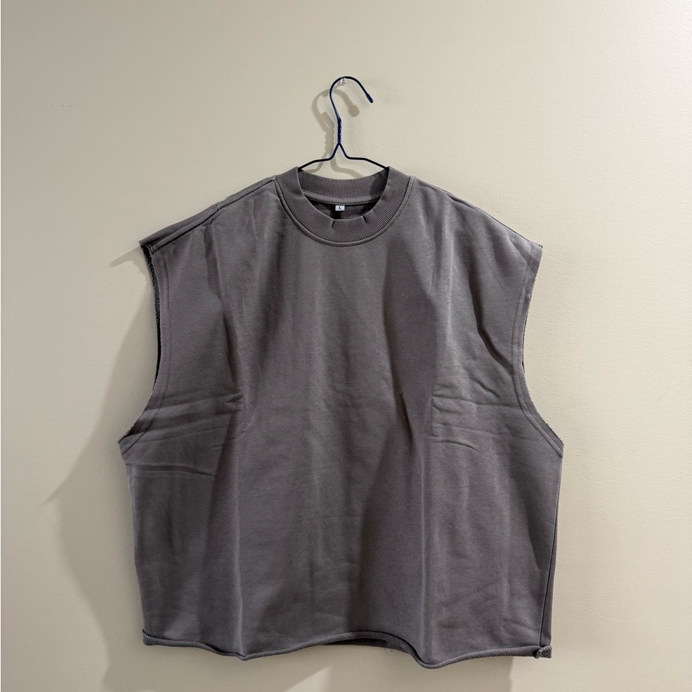 Grey sleeveless cropped fit tee with a relaxed fit #minimalist #sleeveless